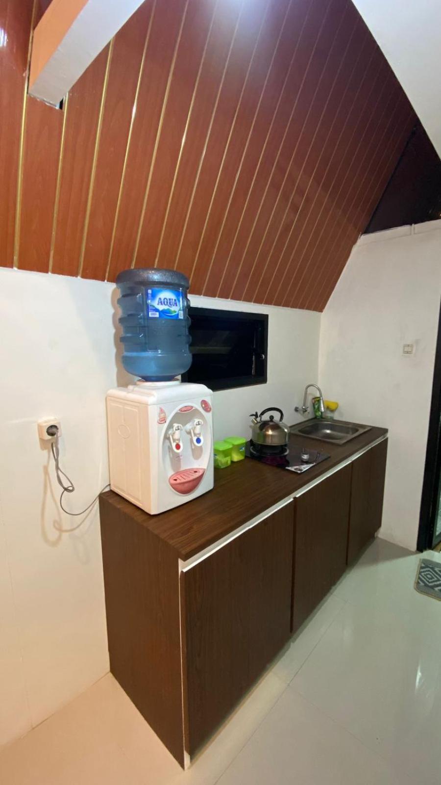 Agriya Lubis Cabin Diyeng Rom bilde